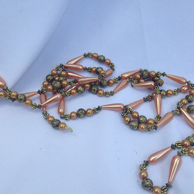 Peach Strand Beads - Themed Rentals - Beautiful bead strands